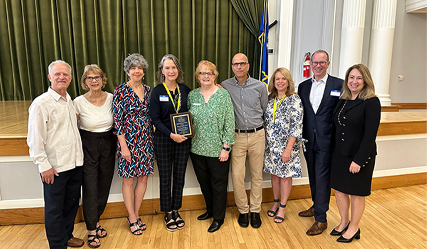 The Bridge board of directors with award