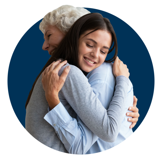 Two people hugging and comforting each other