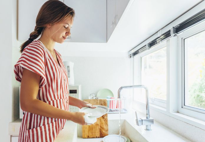 Woman doing dishes