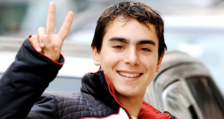 Teenage boy with peace sign