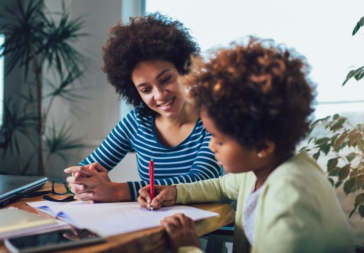 Parent helping child with school work
