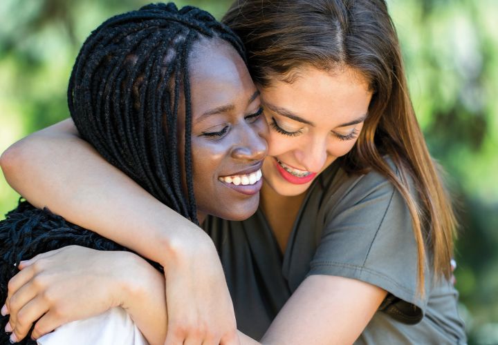 Teenagers hugging