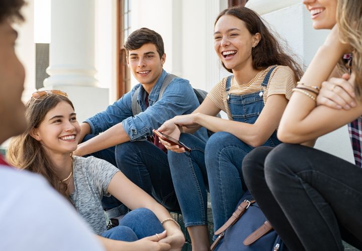 Teenagers laughing together