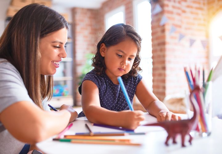 Parent helping child with school work