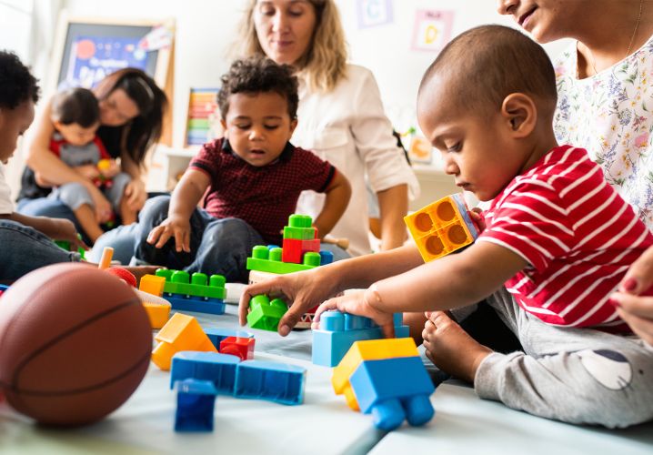 Toddlers playing with toys
